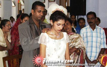 Jobin Jofy marriage photo at St Marys Church Bharananganam